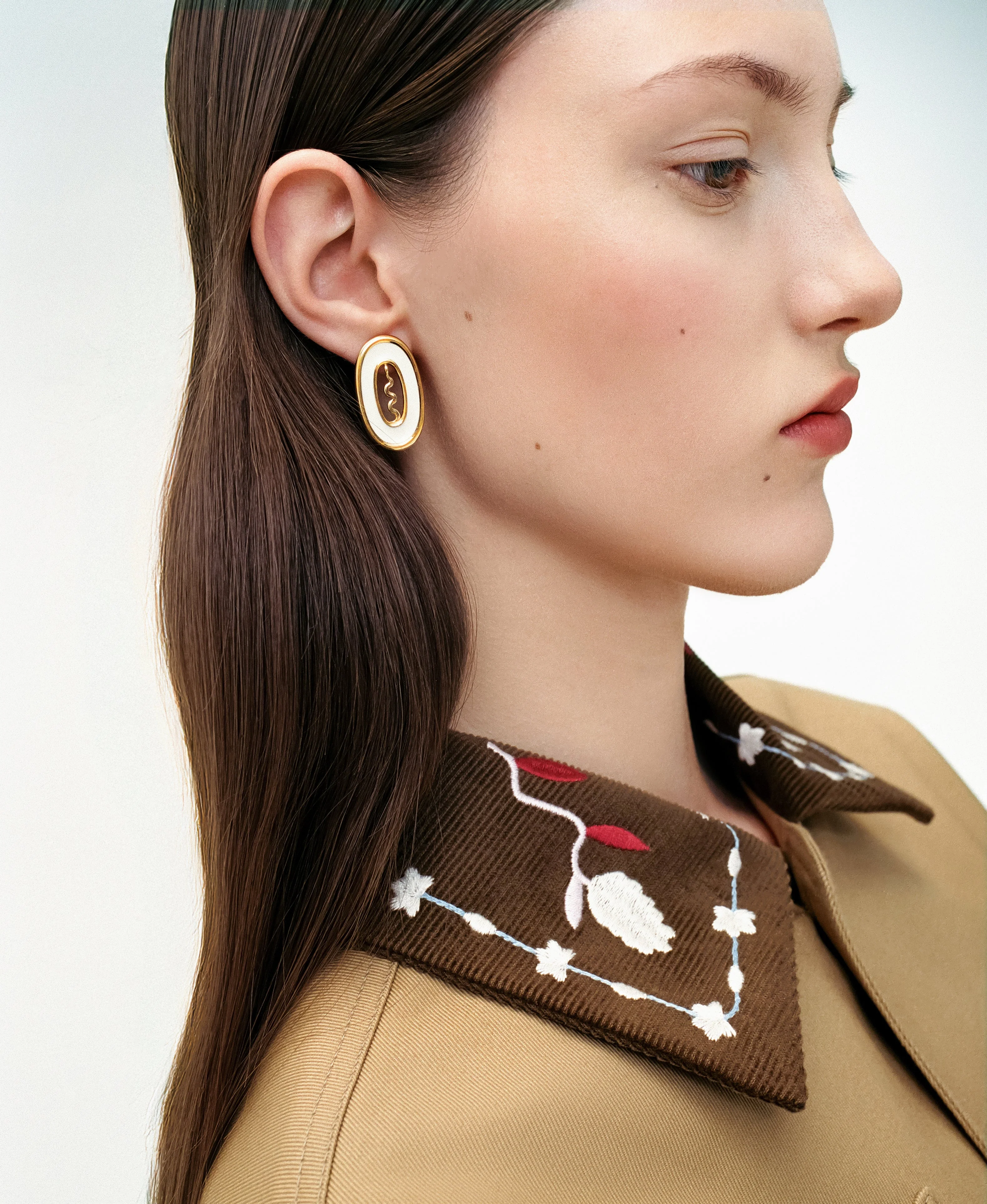Serpent Earrings in White - Image 3